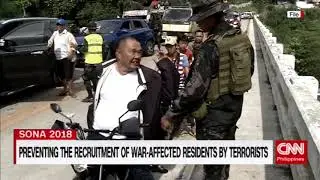 Preventing the recruitment of war affected residents by terrorists