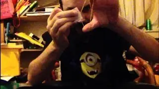 Money Magic: Rubber band through bank note