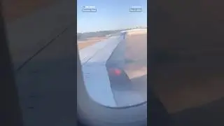 A video shows a United Airlines flight with flames coming from under the wing of the plane.