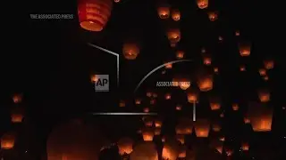 Paper lanterns released into night sky in Taiwan as good fortune sought in the Year of the Snake