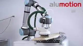Trattamento e finitura superficiale automatizzati di un cofano funebre con cobot Universal Robots