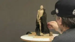 Dipping Cloth in Wax to Make a Buffalo Robe