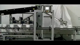 Automated Lid Placer & Lid Press System with Hytrol Accumulating Conveyor