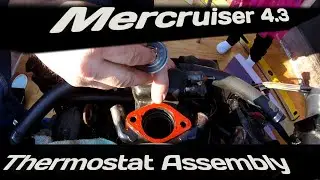 How to install Mercruiser 4.3 thermostat assembly.(with my granddaughter lol).
