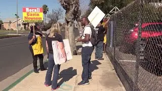 Recall Governor Newsom group protests governor during Fresno CA visit