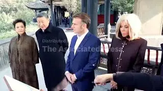 Xi and Macron visit Dujiangyan in Sichuan Province
