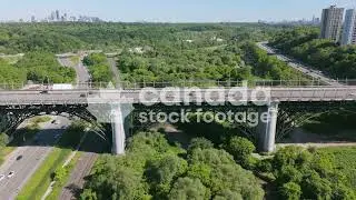 Drone aerial Bloor Viaduct bridge stock video. Toronto summer. 4K Royalty free.