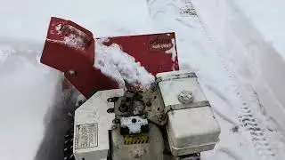 1972 Ariens Sno-Thro is tricky to one-hand it with this much snow. 