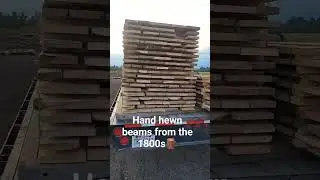 hand hewn beams harvested from barn demo