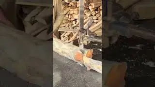 A piece of wood being cut neatly into several pieces using a cutting machine.
