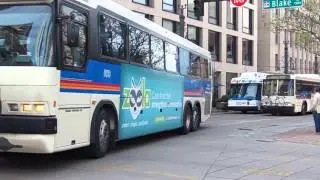 A PARADE OF RTD DENVER BUSES NEAR MARKET STREET STATION DENVER COLORADO