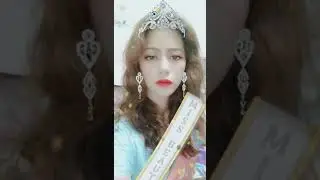 With crown and sash