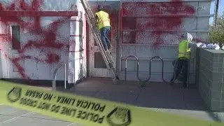 Vandals tag police substations overnight