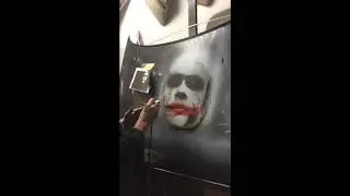 Paul Karslake painting the Joker