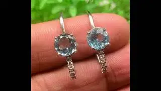 Swiss topaz silver tops with rhodium polish Stone weight: about 4 carats Materials: 925 pure silver