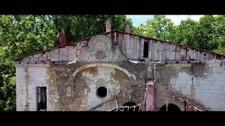 Abandoned castle Spicer and girl in red dress