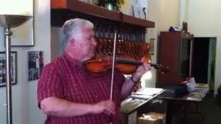 Phillip Injeian playing the violin to sound like bagpipes