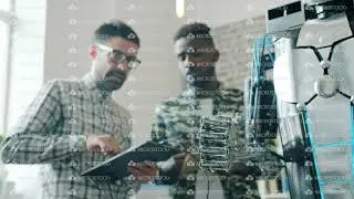 Slow motion of guys testing robot with tablet, smart machine moving arm