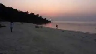 Sunset in front Restaurant Sandy Bay Bungalow