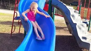 Playing at the Park on the Playground for Kids & Children on Slides, Swings