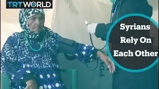 With no one to help them, displaced Syrians help each other