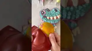 Let's decorate a Summer themed Dinosaur cake with buttercream using the Wilton Dinosaur Cake Pan