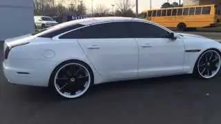 Jaguar XJL on 24 inch Forgiato 3pc Custom Painted Rims smoked out