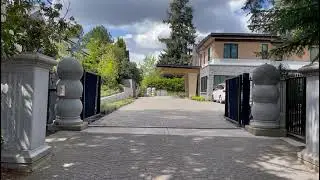 Diagonal Slat Gate with White Pillars  AD Construction Modern Residential Entry