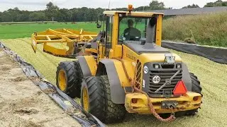 Mais hakselen | New Holland FR9060 + T7030 + TS115 | Volvo L60F | UniCom Oost B.V. | 2017