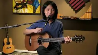 Neil Chan on the appeal of playing a parlor sized guitar. Featuring Dowina Guitars