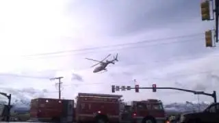 Heli taking off from wreck 7200 S.700 W.