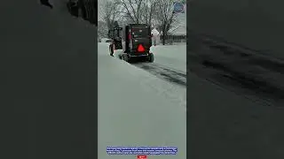 Innovative & Powerful: Heavy-Duty Tractor with Round Baler for Efficient Snow Clearing