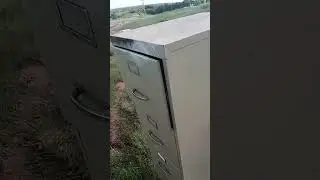 pistol vs filing cabinet