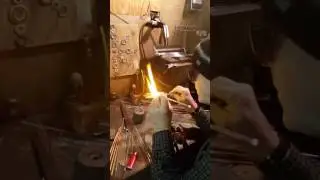 Cameron Tower glass blowing demo - drawing mountain scene on a section