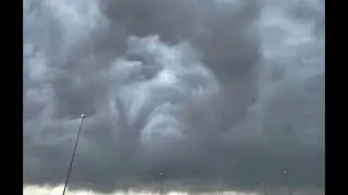 Man face with Afro appears in clouds @ Denver Airport 👀