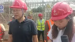 Public Works Minister Giddings Engage CONTRACTORS  At The Site Of The Overhead Bridge