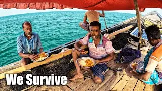 We survive cook and eating crabs, pulled the nets from the sea into the boat and caught fish