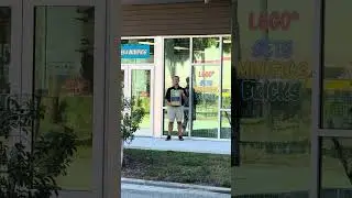 Man with a Sign - Small Business Saturday - Bricks and Minifigs Brandon