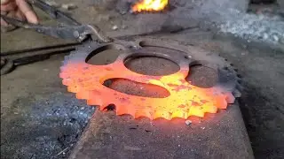 A made farsa out of bike chain sprocket.