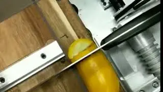 Vegetable Cutter cutting a Squash