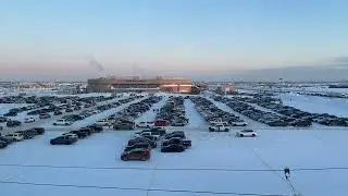 Cars parking at Sasktel Center - Timelapse