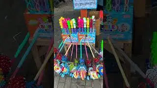 Mainan ayam dorong dan tongkat Stick Bubble Doraemon