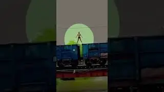 #WATCH: Man caught on camera performing stunts on top of a moving goods train in Greater Noida.