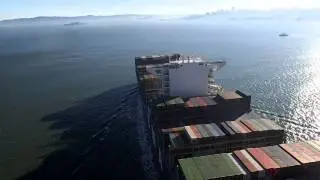 Largest Cargo Ship Passes Under Golden Gate Bridge