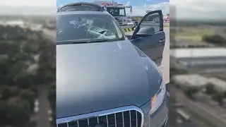 Brake drum flies off truck and through driver's windshield