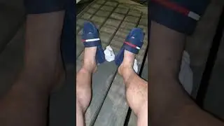 My feet in some Tommy slides. #gay #feet #mensfeet