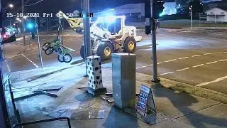 Australian police chase tractor used in daring bike shop ram raid | AFP