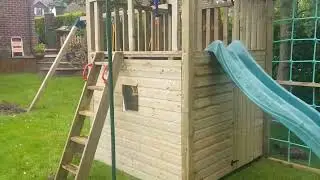Custom climbing frame Play Crazy Climbing Frame Installation. Treehouse sits in the small garden