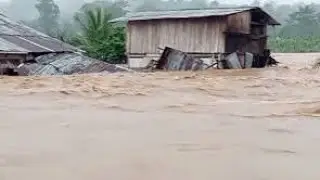 Homes and shops were flooded as heavy rain hit Colombia and Ecuador