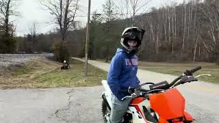 Riding around (four wheeler runs out of gas)